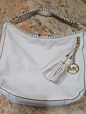 Michael Kors Off White Leather Hobo Bag Purse with Tassel and Gold MK Charm